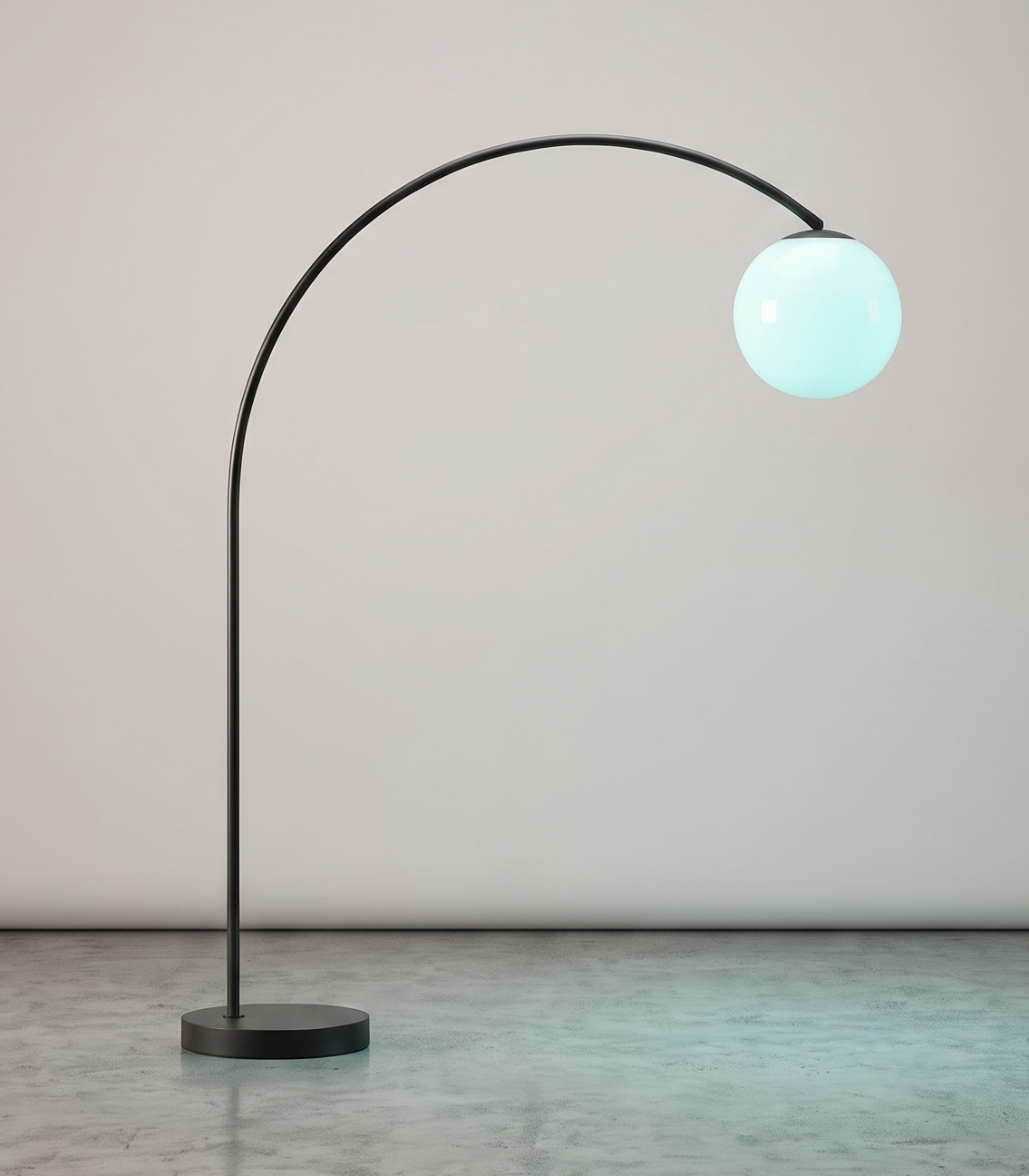 The Arc lamp: a slim steel arc reaching over with a hanging opal sphere.
